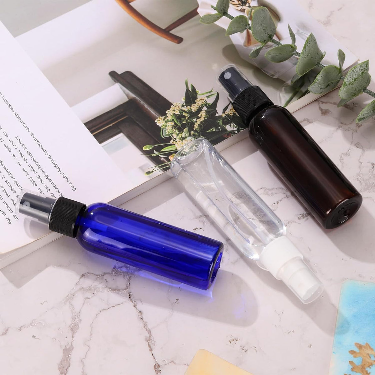 uxcell 100Pack Spray Bottles, 2Oz/60ML Reusable Clear Empty Mist Plastic Mini Travel Bottle Set,Small Refillable Liquid Containers for Household Use, Essential Oil, Cleaning (Transparent)